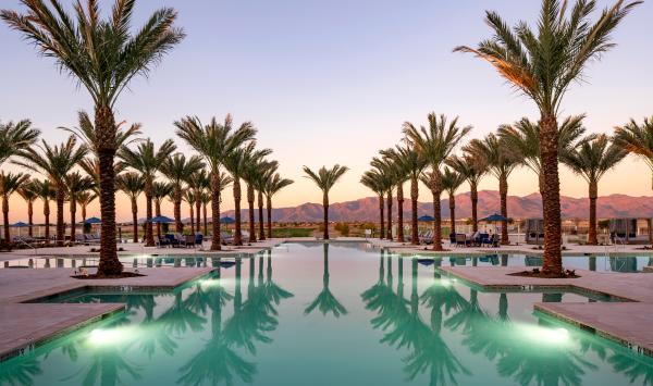 Resort-style pool with golf course and mountain views